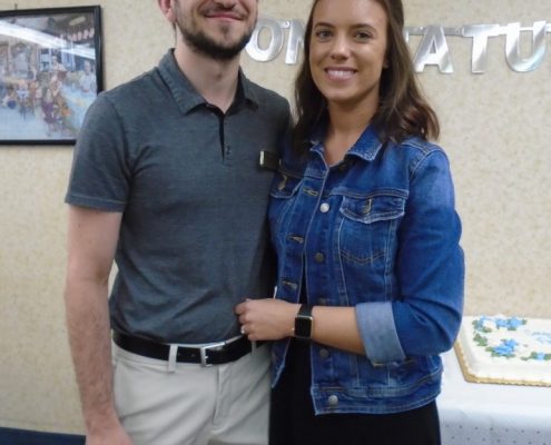 couple smiling at engagement party