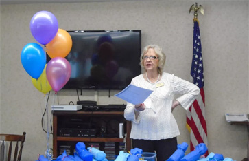 woman speaking to group