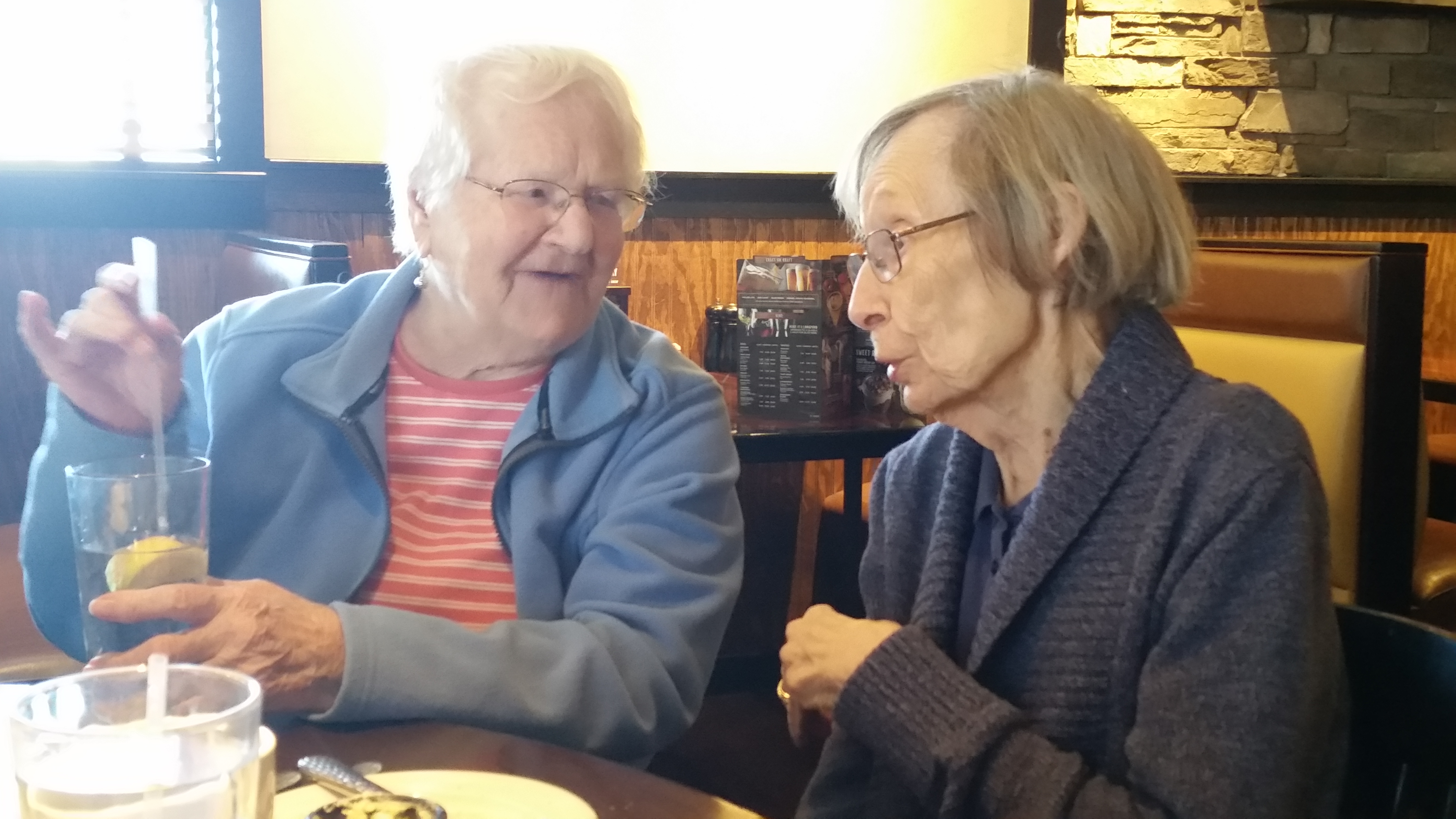 women talking at lunch