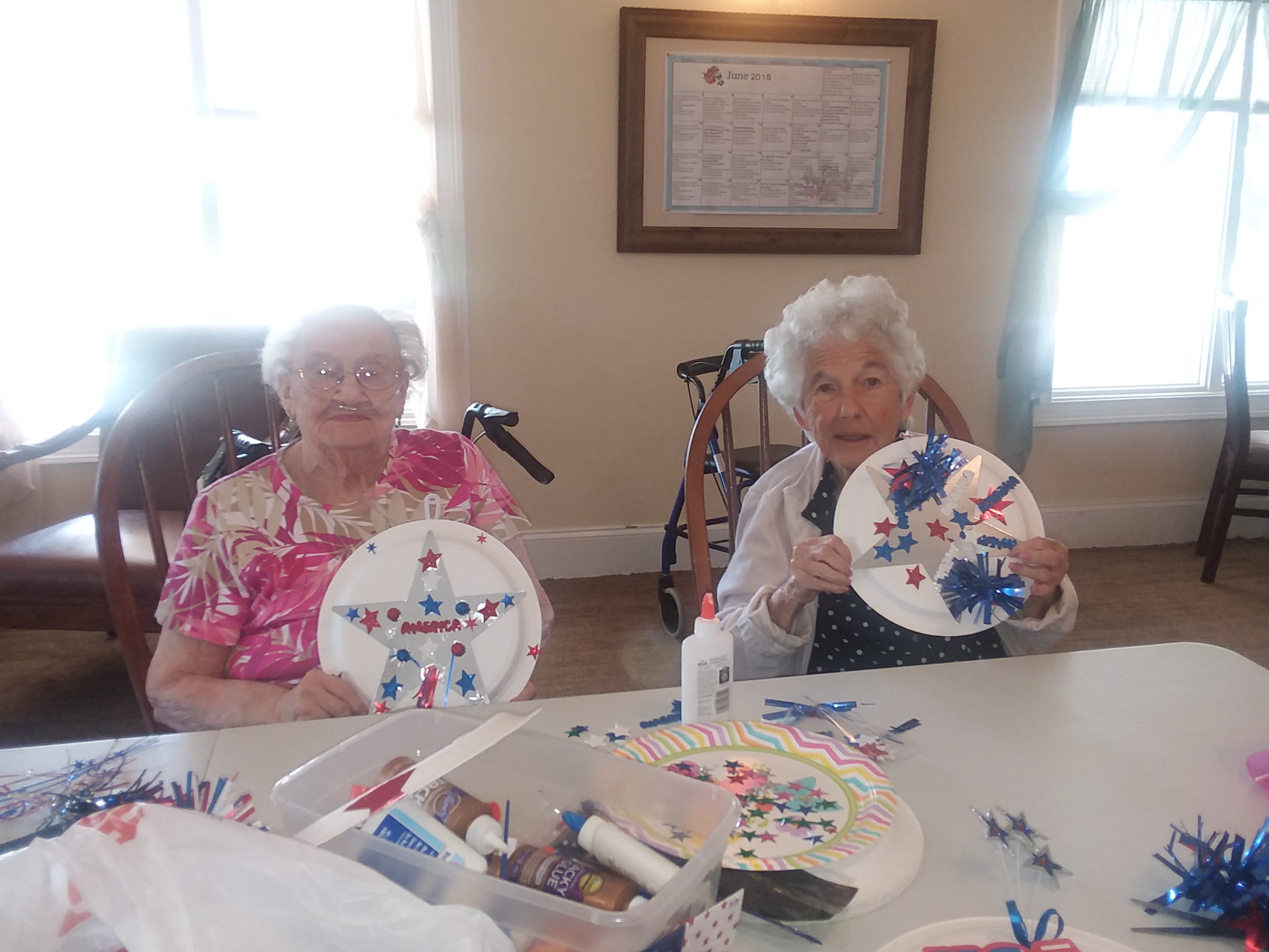 women smiling with fourth of july decorations
