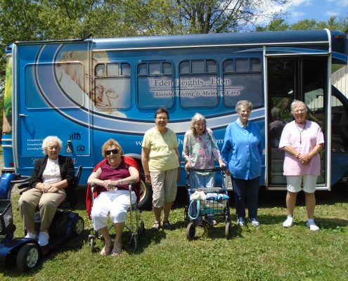 women smiling at park