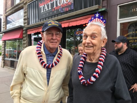 group smiling at memorial day parade