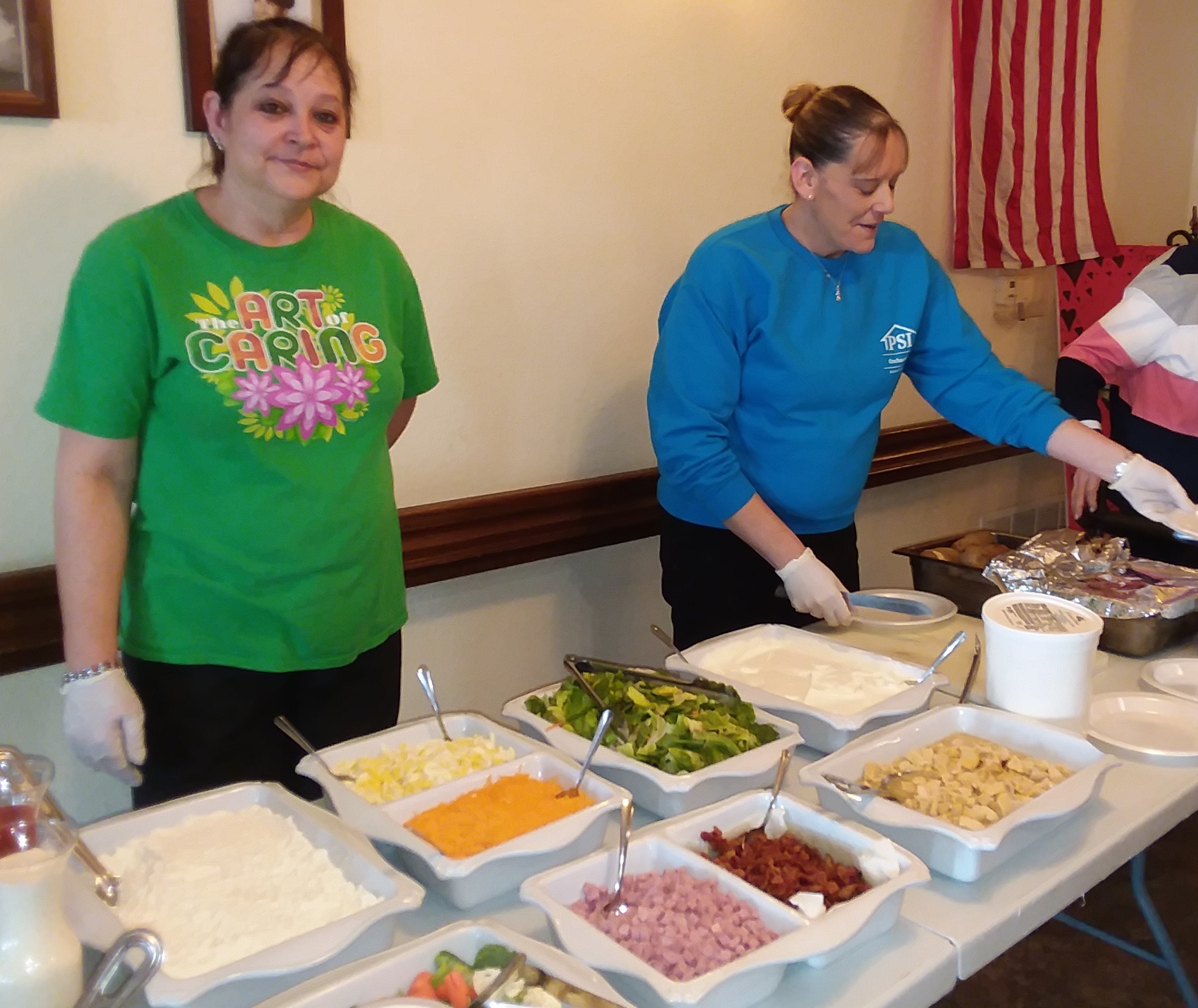 women preparing lunch buffet