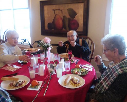 group eating dinner at party