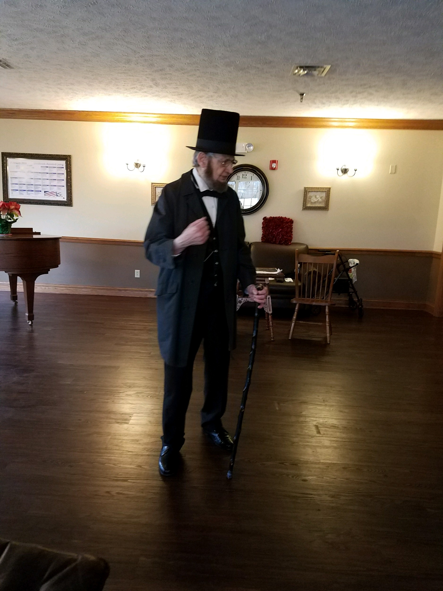 man in abraham lincoln costume speaking