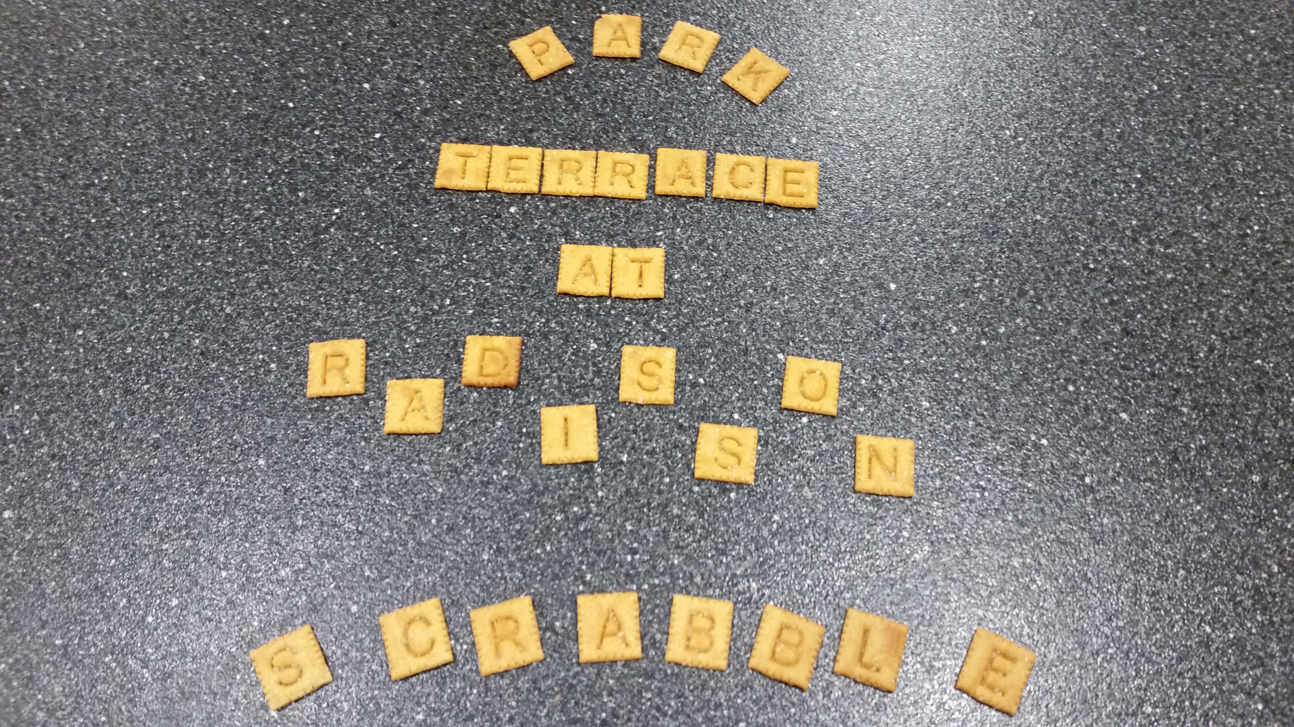 "Park Terrace at Radison Scrabble" spelled with cheez-its