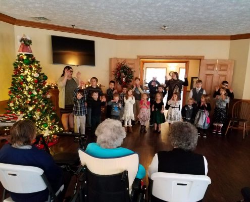 children singing for seniors