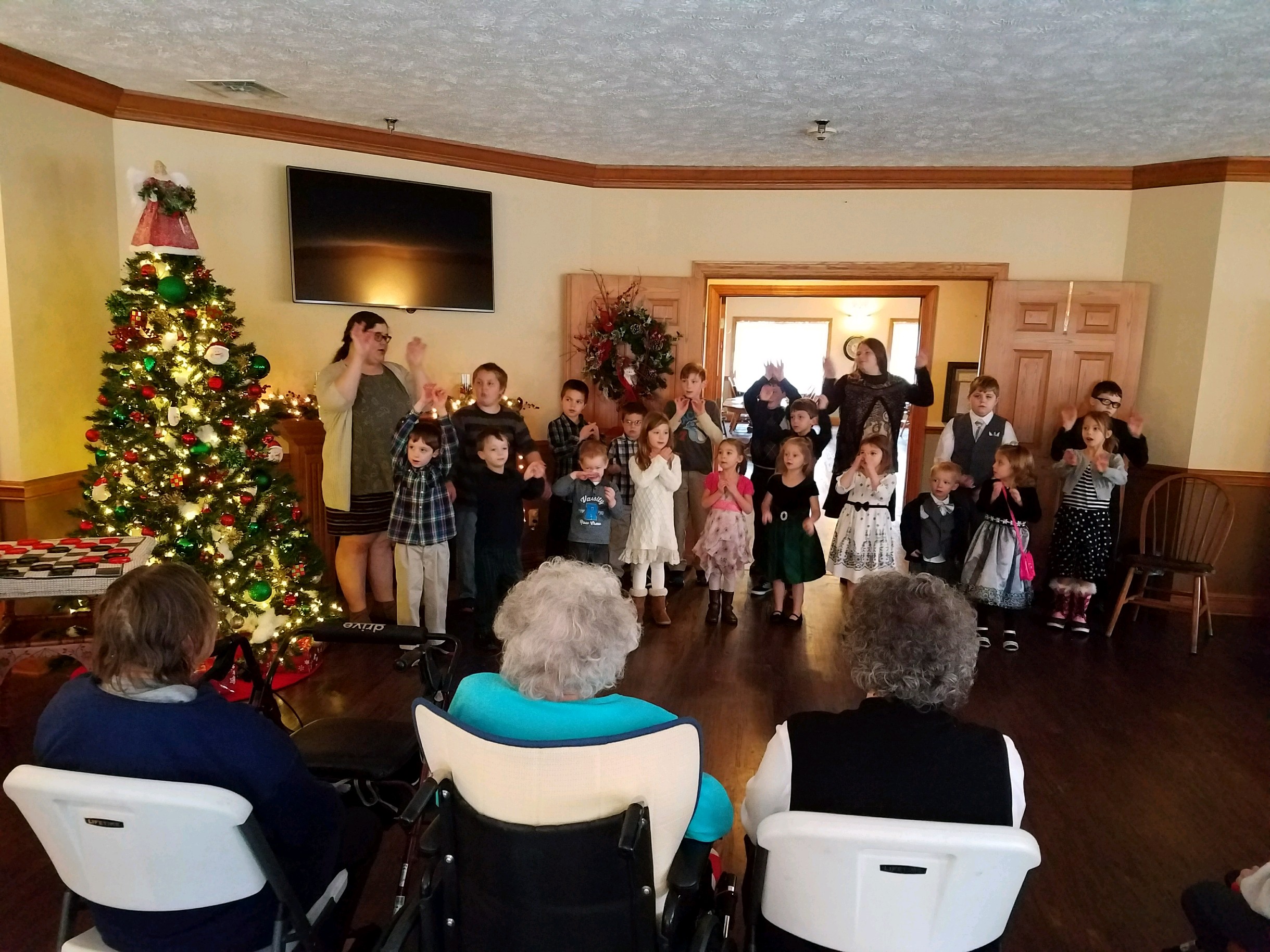 children singing for seniors