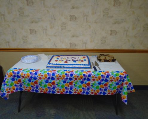 cake and cookies at party table