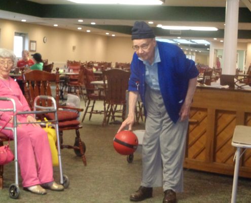 man holding bowling ball