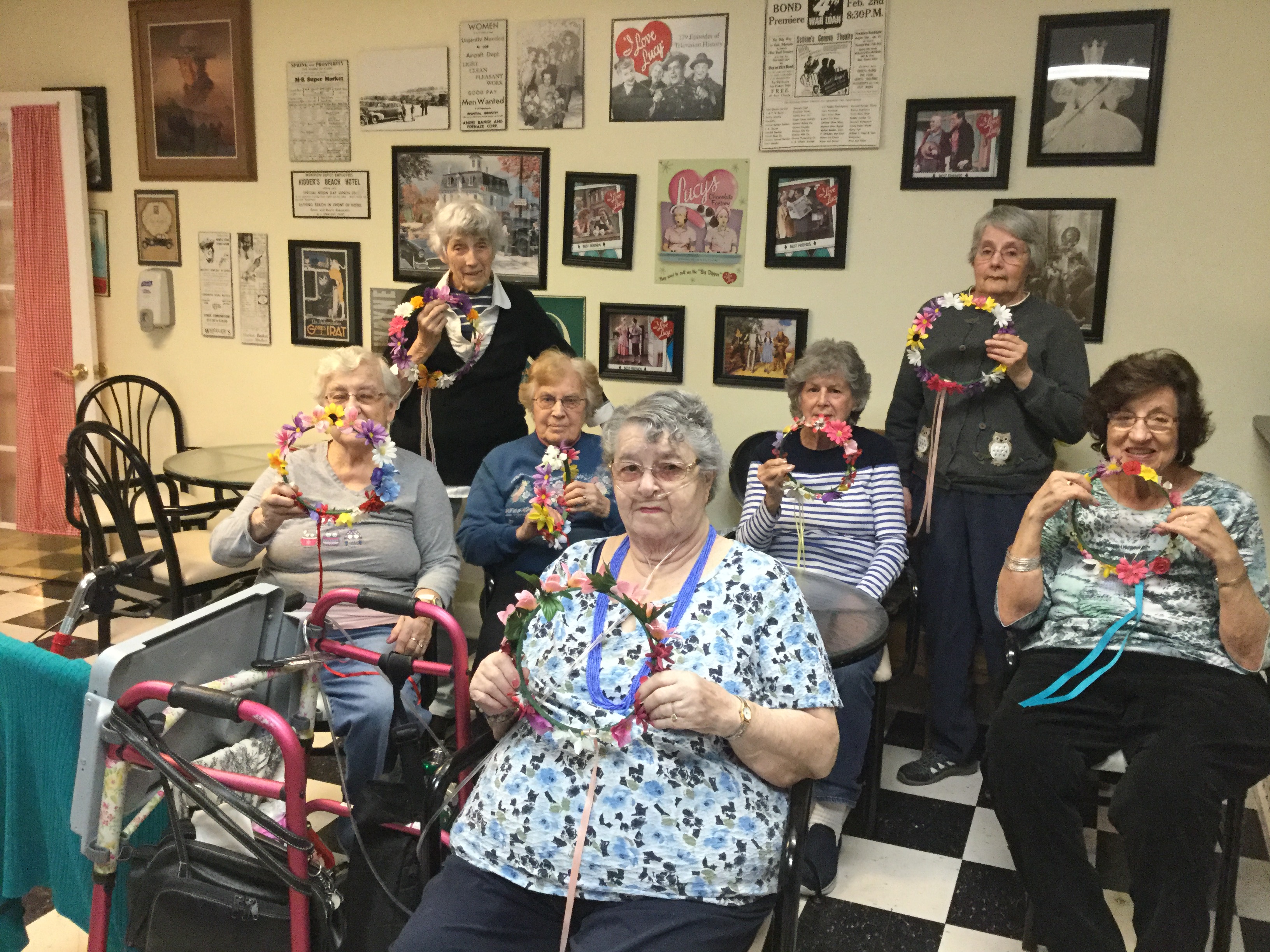 women smiling with flower crowns
