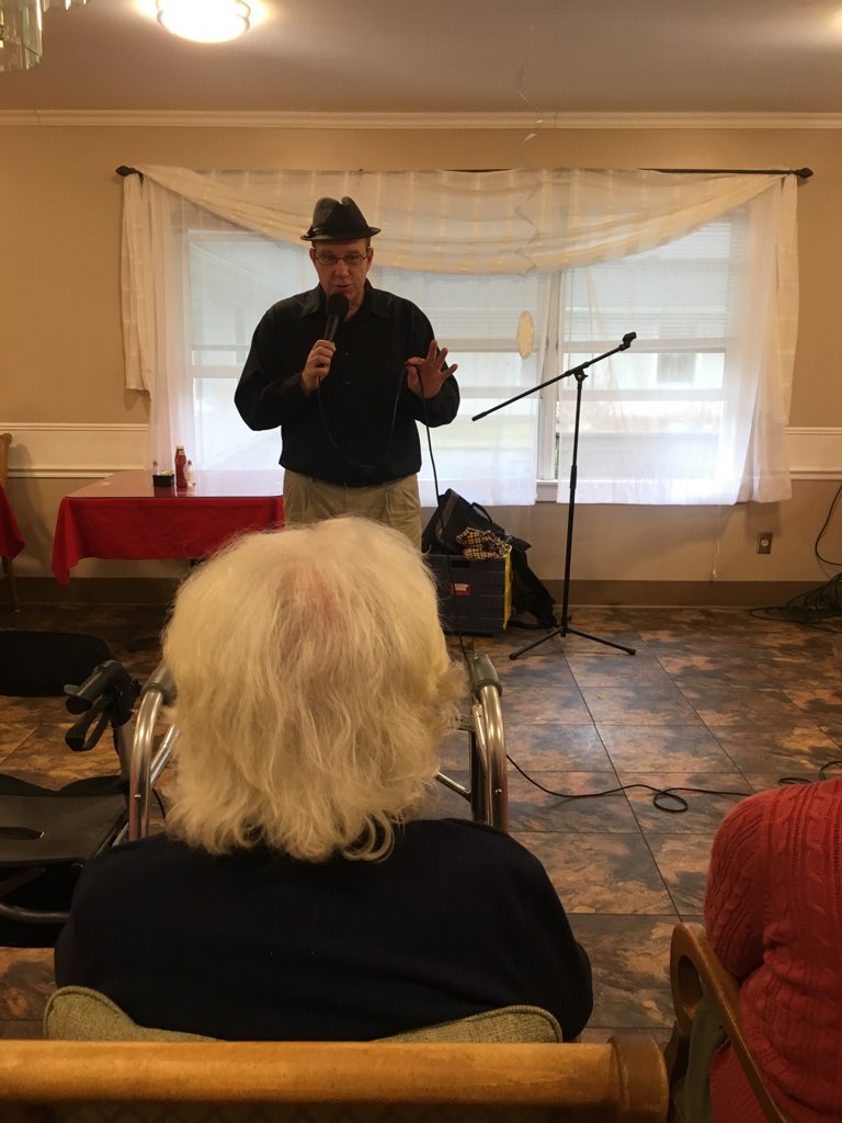 man speaking to crowd