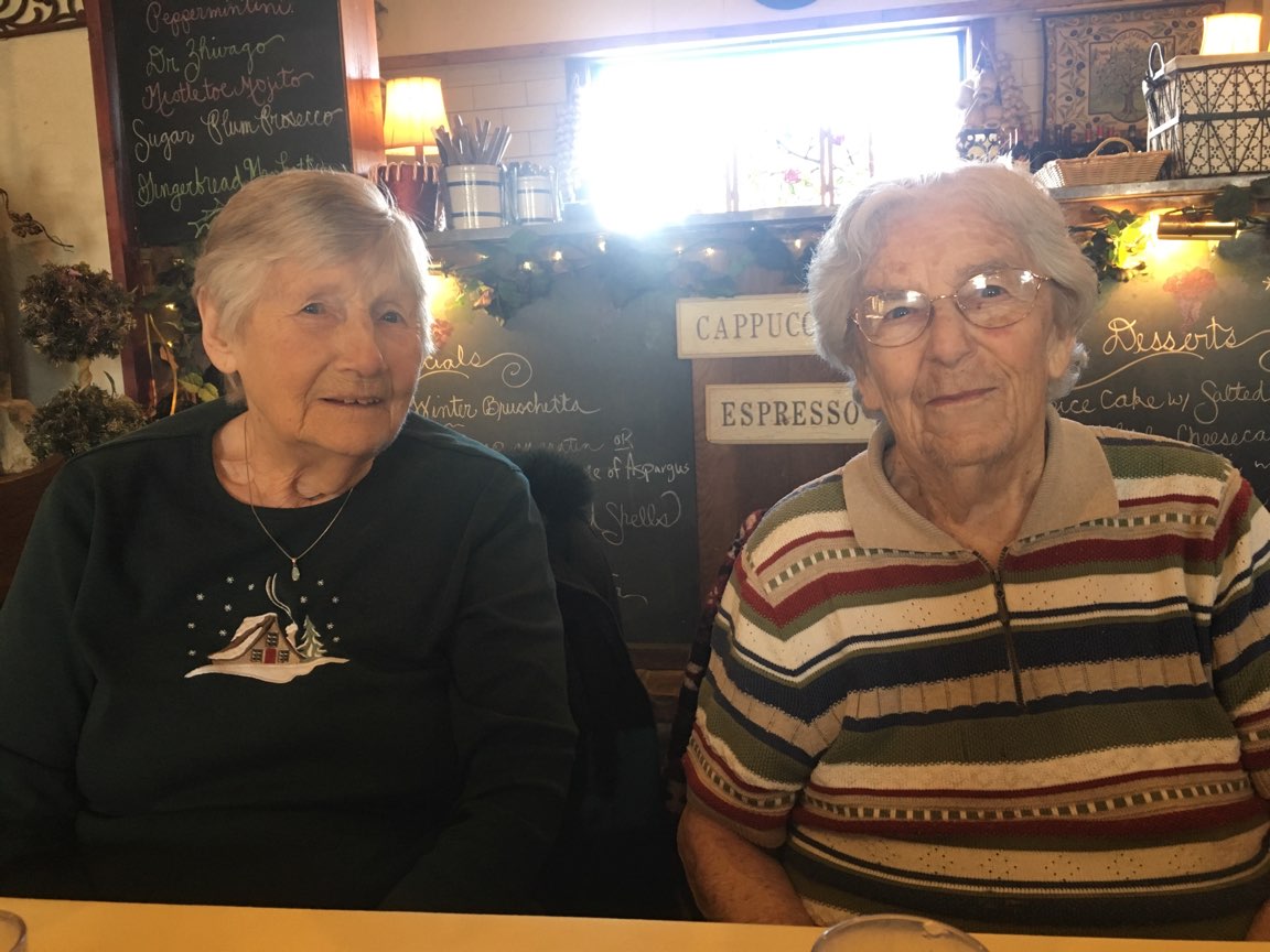 women smiling at lunch