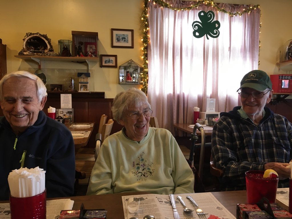 group laughing at diner