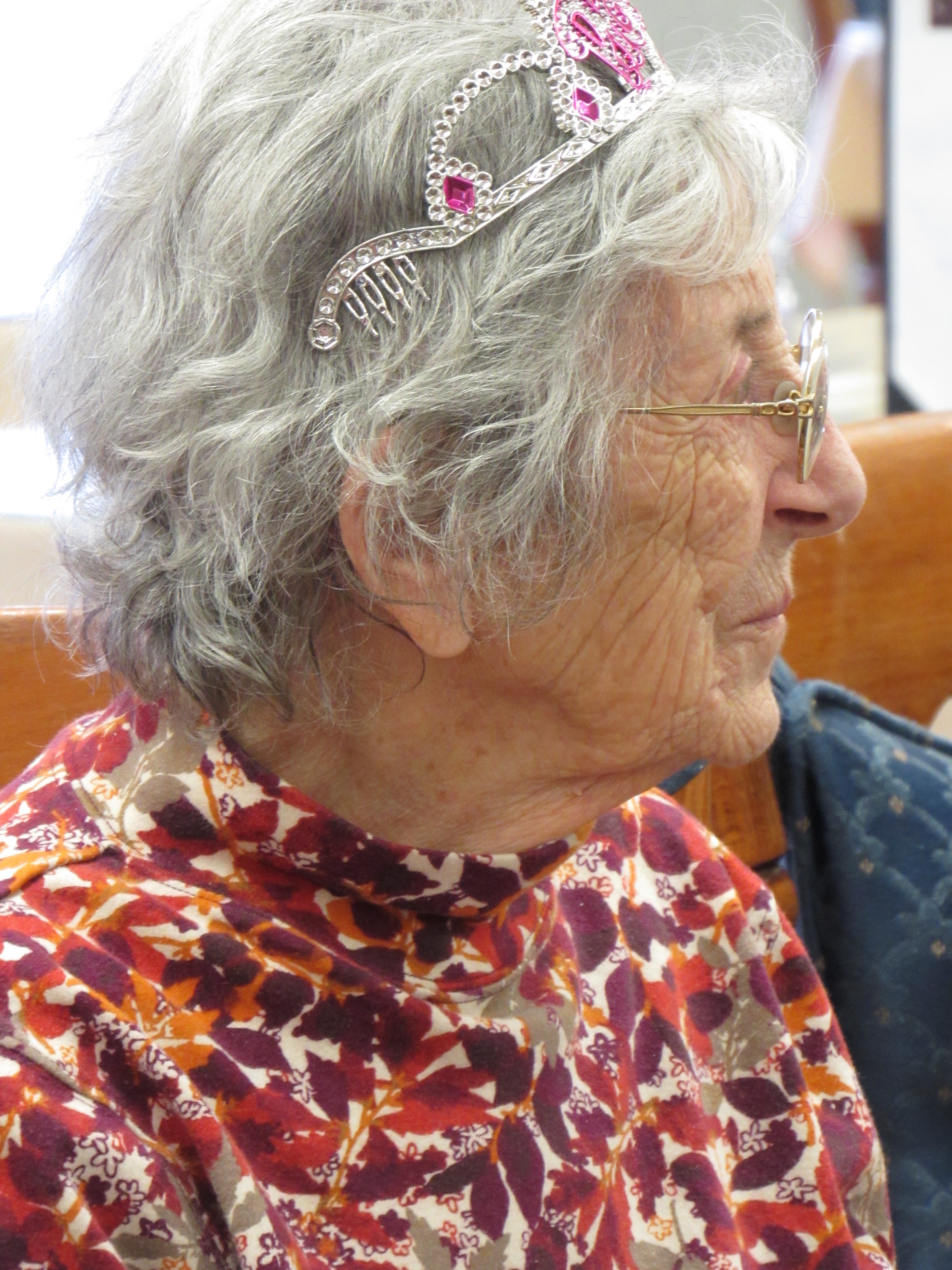woman wearing tiara looking away