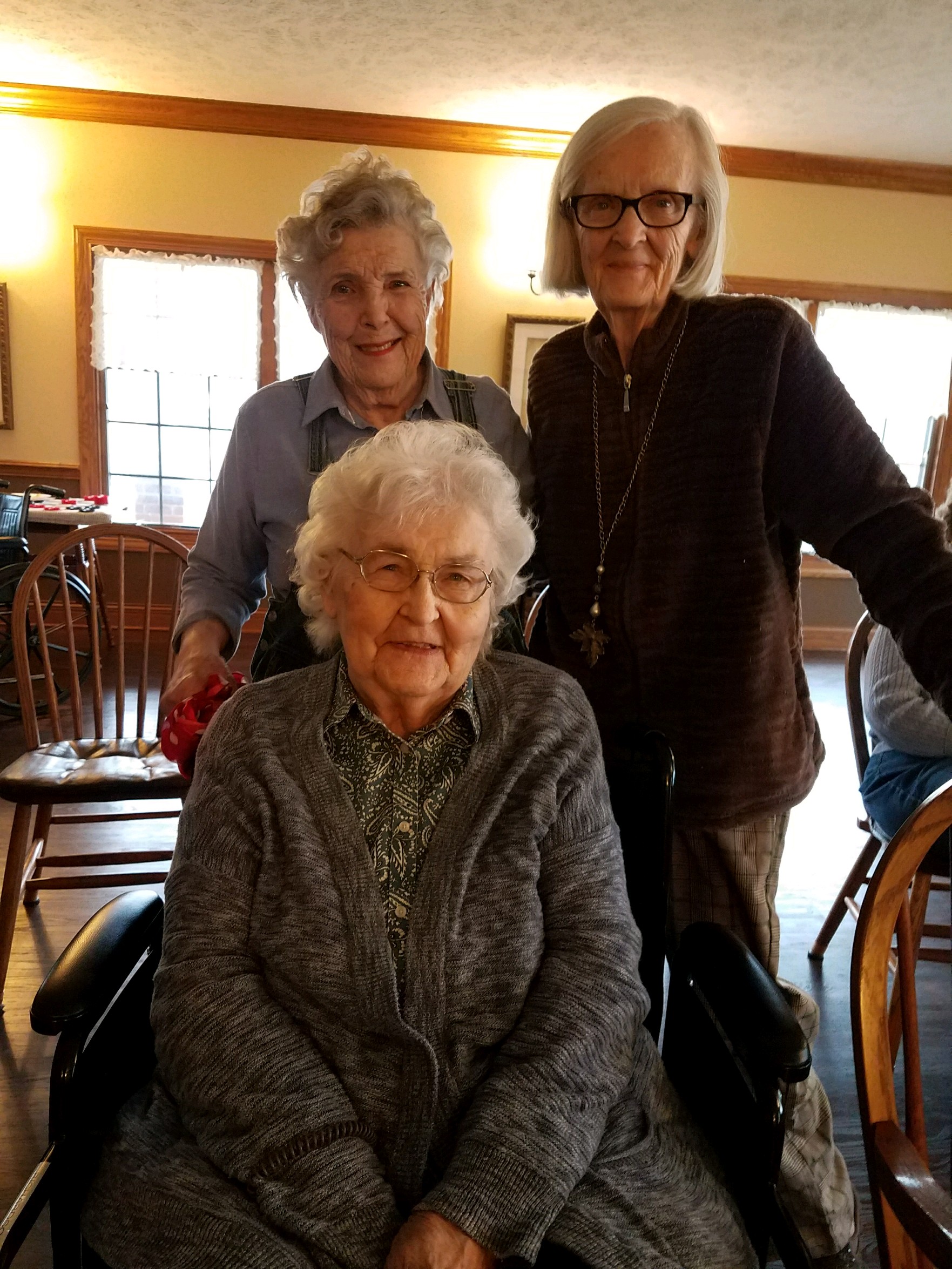 women smiling at camera