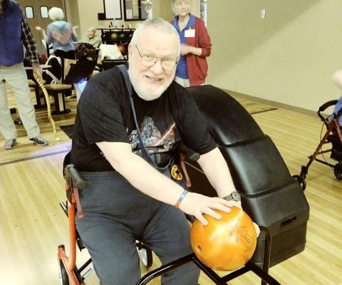 Resident retrieving bowling ball